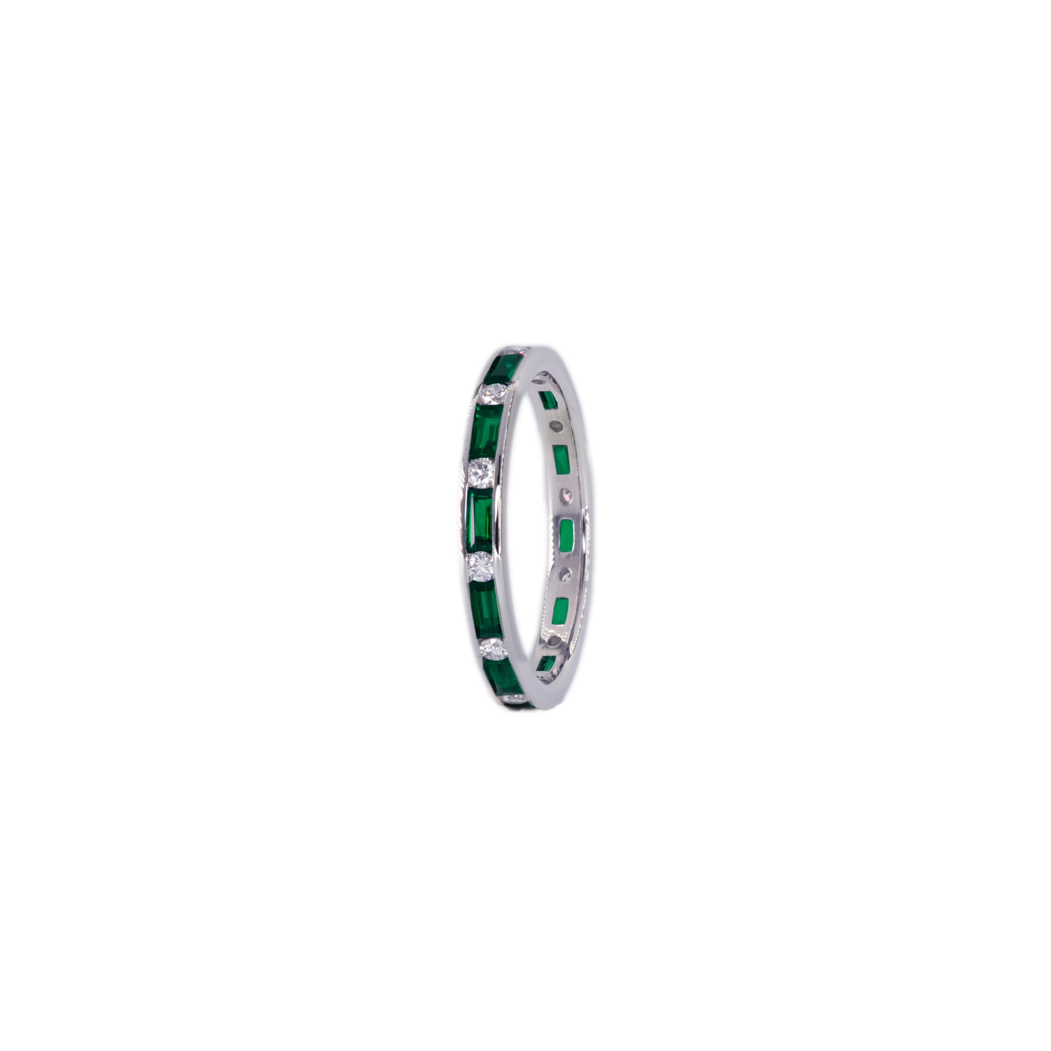 the caroline eternity ring in emerald